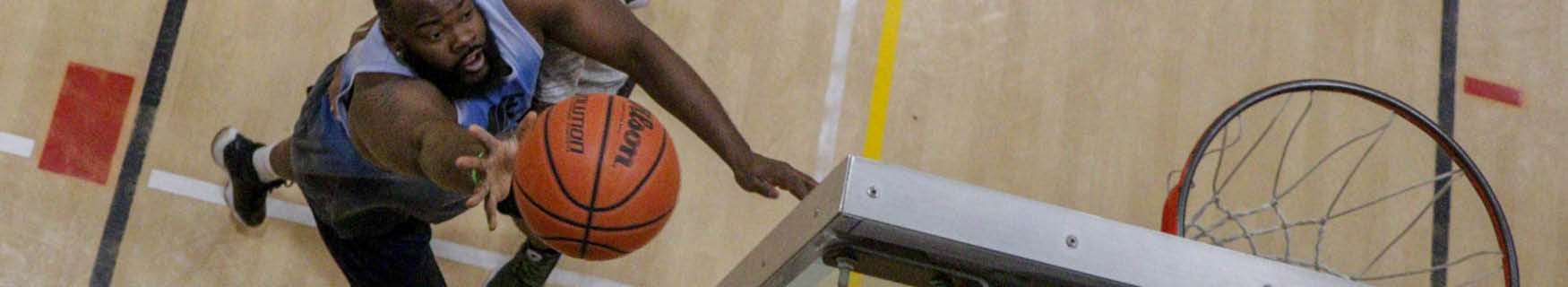 man playing basketball