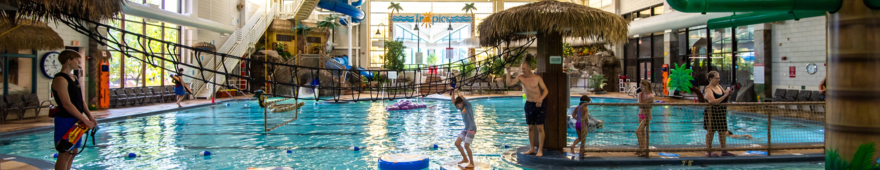 guests using the tropics waterpark